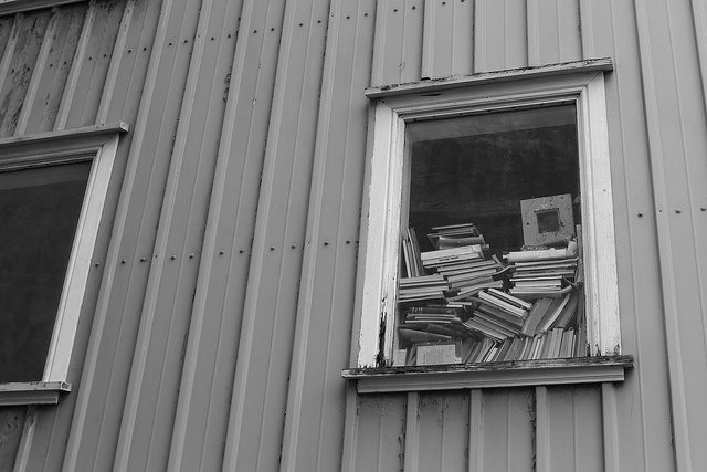 The icelandic way to stack books at a window.